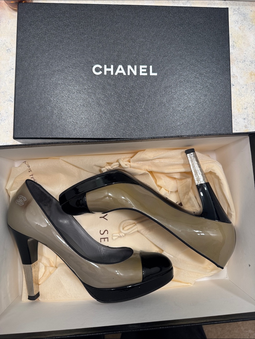 CHANEL Taupe and Black Patent Leather Heels with Silver Accent